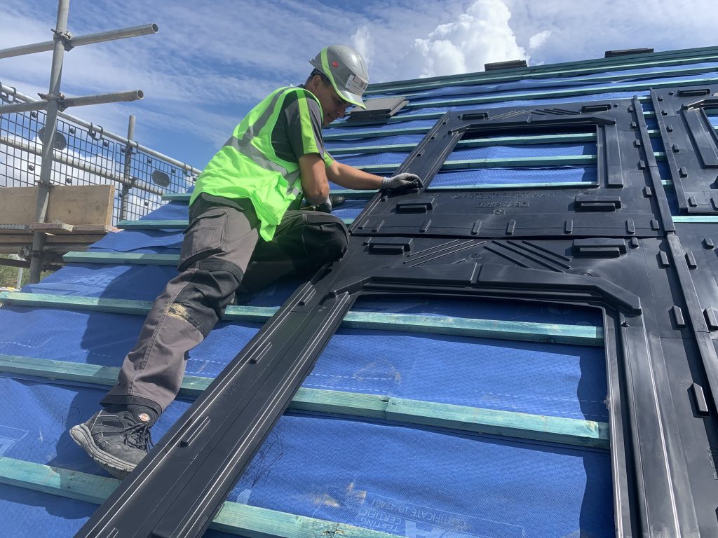 Thunder sparks team installing solar panels on roof